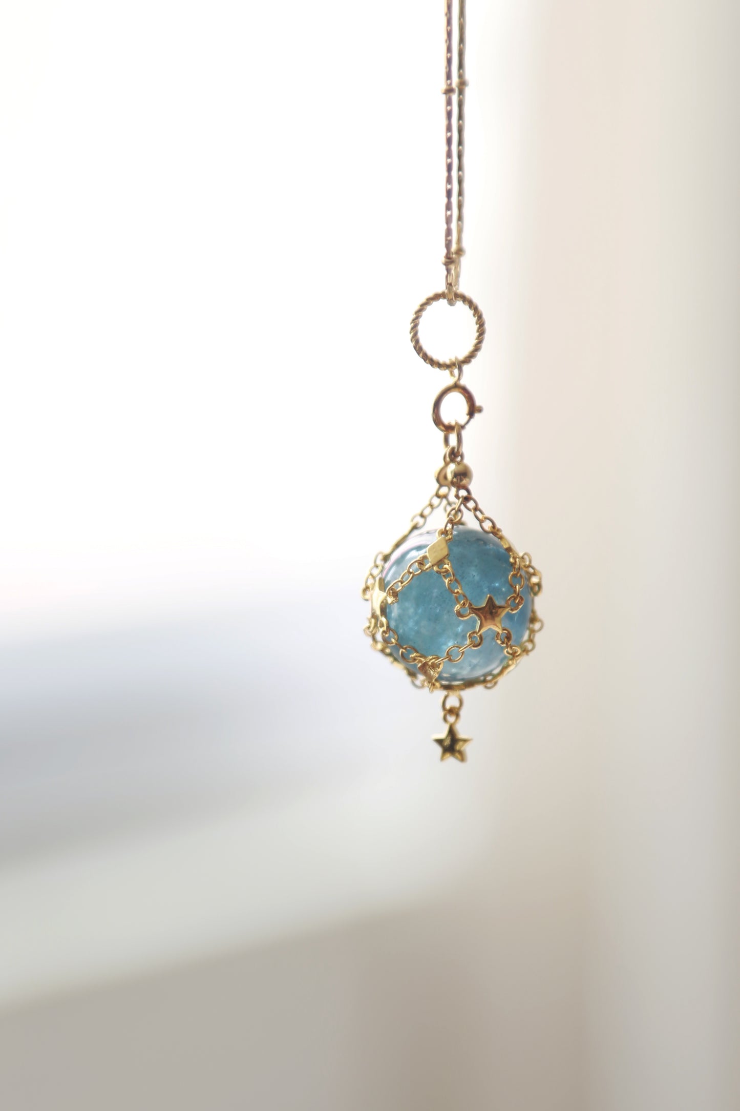 Gemstone Sphere in Star Catcher Mesh Necklace