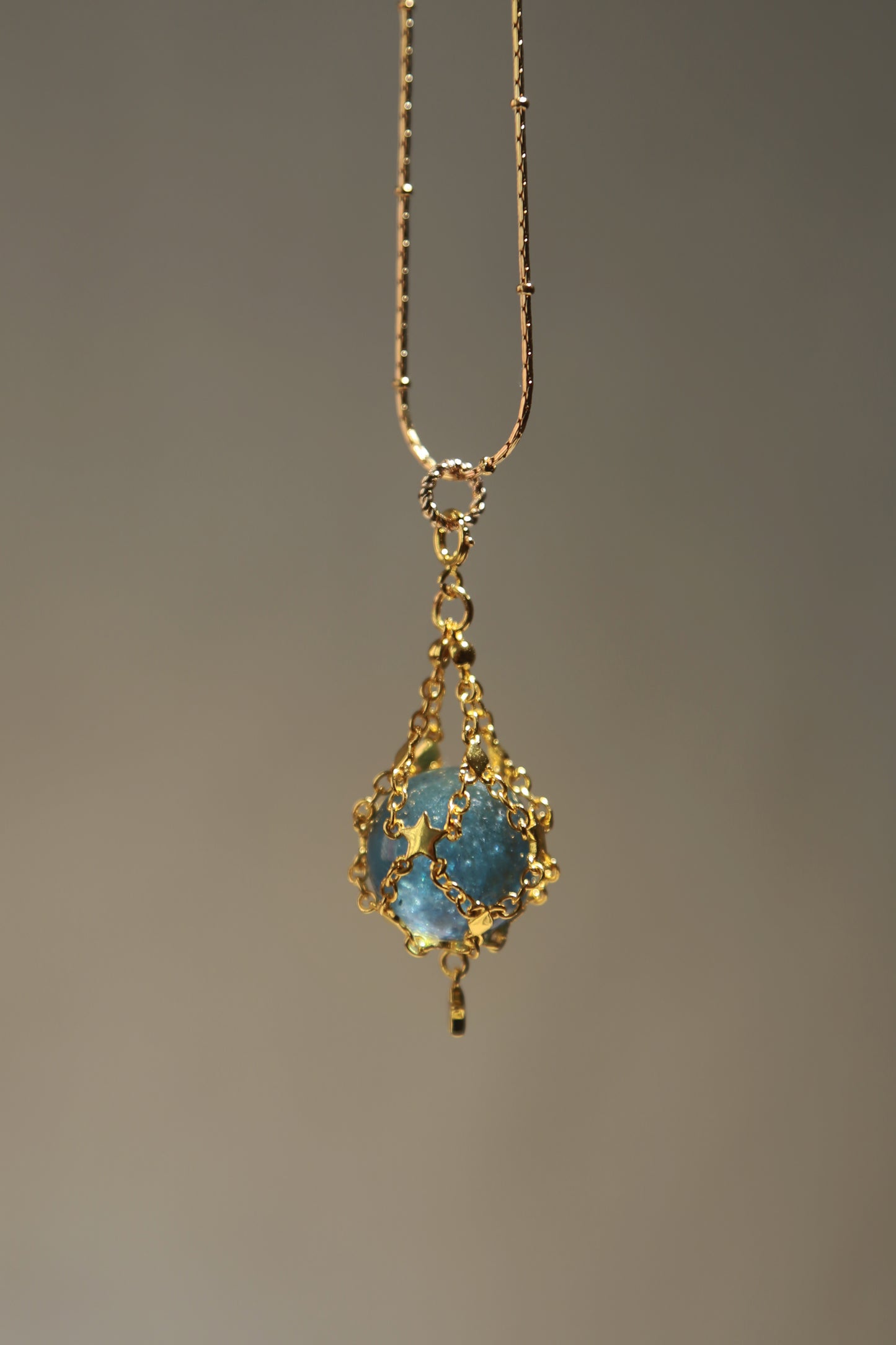 Gemstone Sphere in Star Catcher Mesh Necklace
