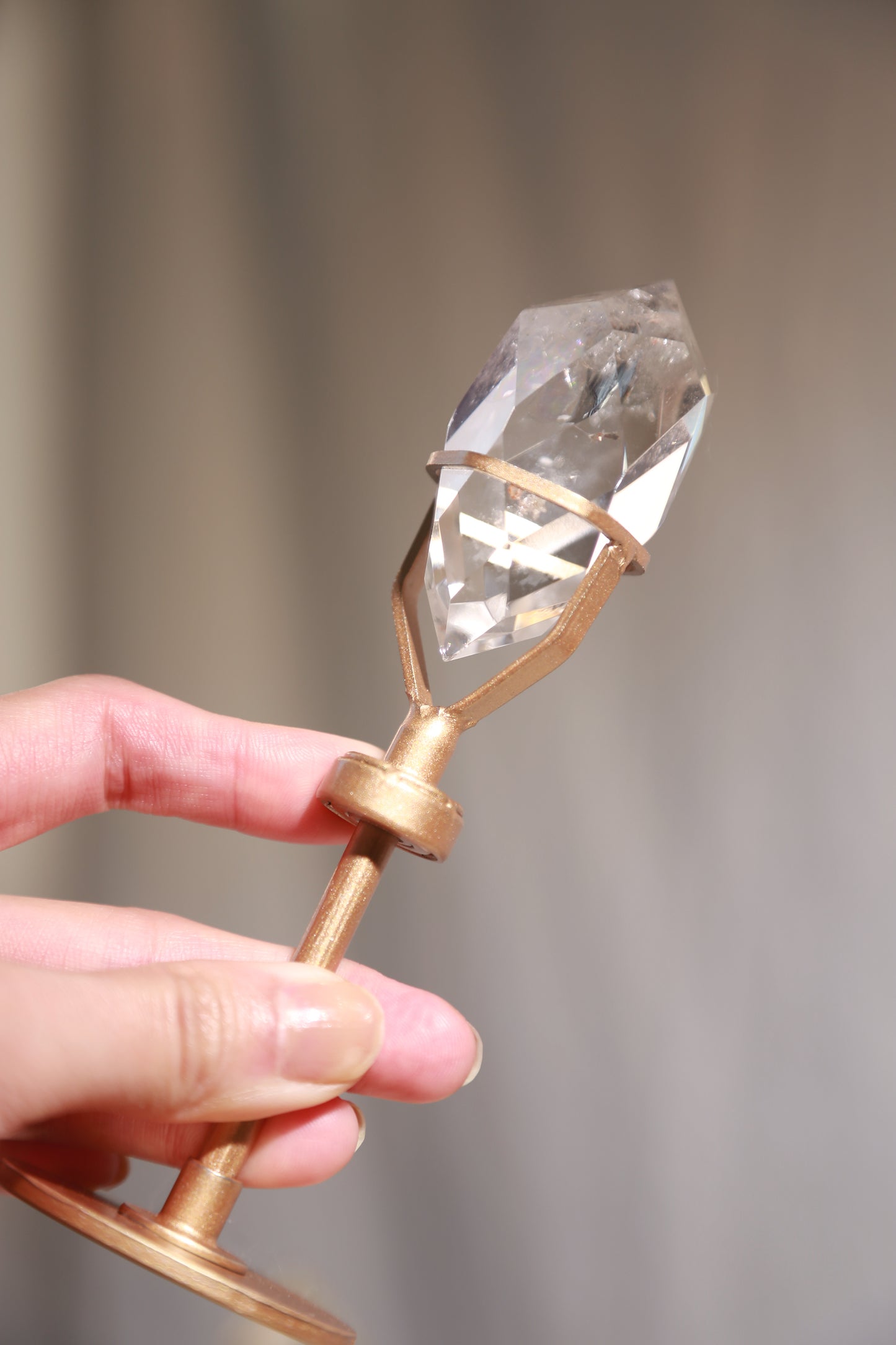 Faceted Clear Quartz Gem on Rotating Wand