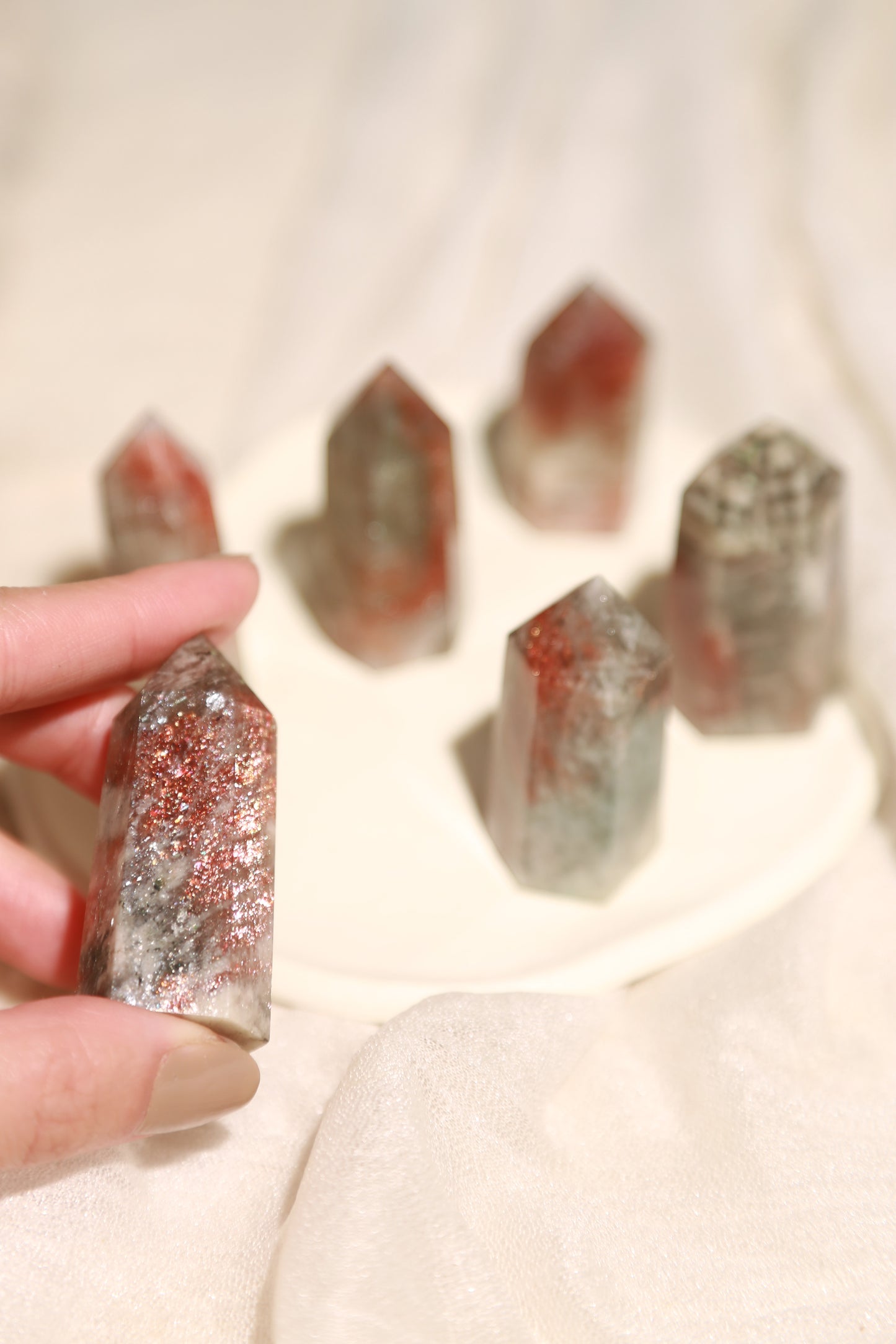 Arusha Sunstone with Green Beryl Point