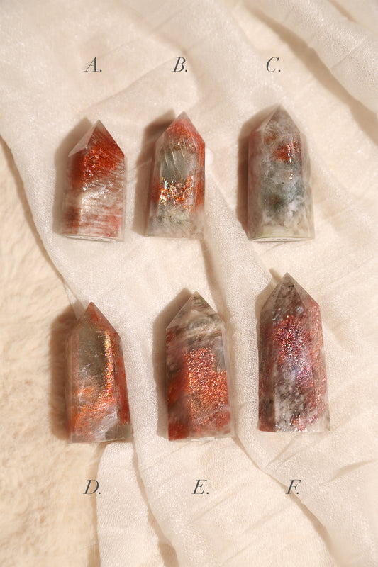 Arusha Sunstone with Green Beryl Point