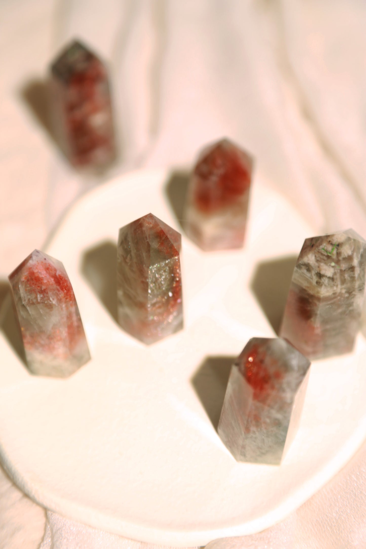 Arusha Sunstone with Green Beryl Point