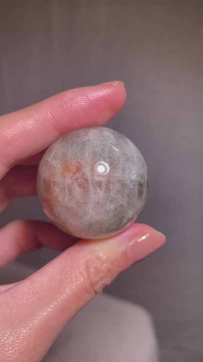 Arusha Sunstone Sphere with Green Beryl